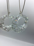 Large Glittery sparkling dangly resin hoop earrings in silver, modern, statement, funky jewelry