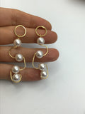 Long gold and Pearl earrings