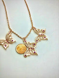 Rose gold butterfly necklace enameled in blue or purple