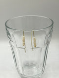 Freshwater pearl earrings, minimalist, sleek, modern, in gold or silver